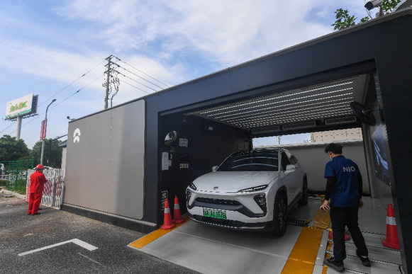 企業忙布局 換電“喚”標準——新能源車換電行業發展觀察